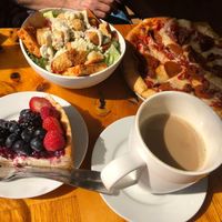 Vegan Caesar Salad, vegan pizza, vegan cheesecake and orzo latte. So delicious! Pic taken October 2023.  at Pulse Cafe in Hadley