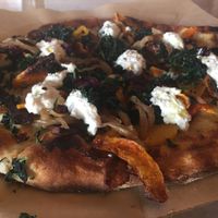 Sweet potato, kale and almond ricotta pizza at True Food Kitchen in Denver