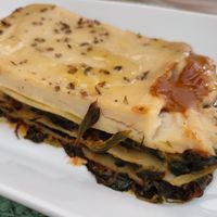 Lassanya d'espinacs at Mandala Kitchen in Lescala