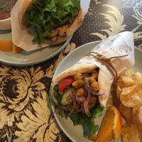 Cup of veggie chili, mushroom sandwich without feta or yogurt sauce, Greek chickpea wrap without feta, side of chips. at Curio Espresso and Vintage Design in Kanazawa