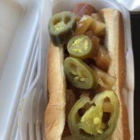 This hotdog has marinated pineapple and jalapeño on it  at Mad Dogs Hot Dogs in Venice