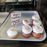 What they had left of their vegan cupcakes. I got a strawberry vanilla one. at Cake Among Us in Rancho Cucamonga