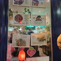 Unassuming front window at Vegan Yes in East London