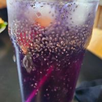 Blue tea with chia seeds, orange, Kombucha. at Vegan Yes in East London