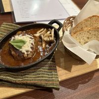 Soy Hamburg steak with brown sauce and vegan cheese   at Loca Kitchen in Tokyo