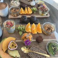 Closest tray is vegan, far plate is not  at Cafe Feel Good in Copenhagen