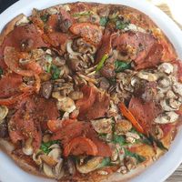 Al Matricana pizza (salami, olives, mushroom, spinach) $26 +vegan tax at Versachi Pizza and Wine Bar in South Yarra