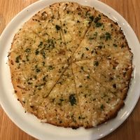 Cheesy garlic crust starter  at Versachi Pizza and Wine Bar in South Yarra