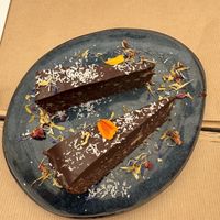 Two thin slices of cake 9€  at Les Baux Jus in Les Baux-de-provence