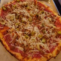 BYO small pizza with vegan cheese, vegan sausage, art hearts, and giardiniera at Need Pizza in Cedar Rapids