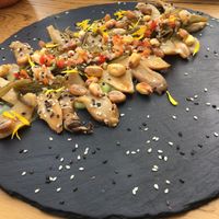 Not-octopus (vegan) made with mushrooms, miso, sea weeds, on top of an avocado&wasabi cream  at Verde Sazon in Santiago