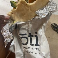 Gf Veggie pita was great. Pick your own vegetables is the best option. I got carrots, Brussels sprouts, onions, chick peas, rainbow veggie blend, olives, tahini. Tasty+fillingg  at Roti Modern Mediterranean - Dearborn in Chicago