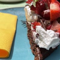 Chocolate cake with cream and strawberries   at PappaGioia in Florence