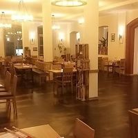 The restaurant inside, but outside sitting is also available. at La Flamme Grand in Limburg