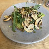 Avocado toast with mushrooms at Nude Cafe in Ibiza