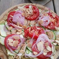 Vegan hot flat bread with spiced hummus and veggies at Nude Cafe in Ibiza