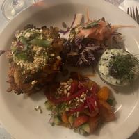 Lasagna with amazing side salads and tzatziki   at Atlas Bar in Copenhagen