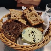 Bread with herb butter  at Atlas Bar in Copenhagen