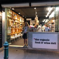Small stall with about 8 stools  at The Organic Food and Wine Deli in Melbourne