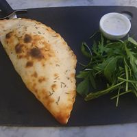 (Calazone) Orto: Char-grilled courgettes, spinach, tomato, garlic, roasted peppers and some serious chilli. Served with salad and house dressing. #Veganuary at Pizza Express - Trafford Centre in Manchester