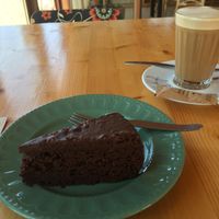 Chocolate cake and galao with oat milk  at Gaia Loja Restaurante in Rogil