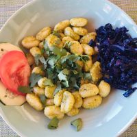 Gnocchi with pesto and Salad  at Gaia Loja Restaurante in Rogil