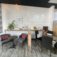 Seating area inside cafe  at Antoinette's Cafe in Buford