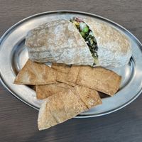 Whole wheat tortilla wrap with falafel and veggies, with pita chips  at Salata in Cedar Park