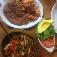 Tofu fajitas with refried beans, lettuce, avocado, tomato at Polli's in Makawao