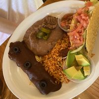 Taco and enchilada plate ( no dairy ) with veggie taco mix  at Polli's in Makawao