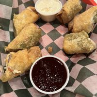 Avocado rolls with vegan ranch. AMAZING! Just let them cook for a minute. I was starving and burned my tongue    at Harp and Hound in Ogden