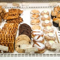 Vegan worstenbroodjes, gebak en donuts. Alles is heel lekker, proef zeker de pecankoeken! at Bakery Frimout in Ghent