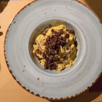 TAGLIATELLE WITH HEMP RICOTTA, CARROT CREAM AND CRISPY SEITAN at Soul Kitchen in Genoa