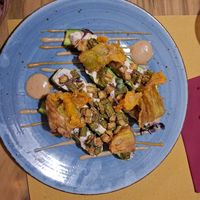 Zucchine ripiene con prescinseua e olive taggiasche e in scapece coulis di pesche e capperi at Soul Kitchen in Genoa