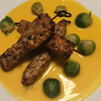 Tempeh skewers, Brussels sprouts, and vegan béarnaise at Soul Kitchen in Genoa