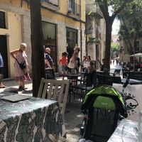 Outdoor seating view at Om in Girona