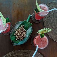 Fresh watermelon juice and free peanuts snack at Miro's Garden Restaurant in Ubud