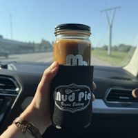 Coffee comes standard with a glass jar and koozie… amazing    at Mud Pie Vegan Bakery and Coffee in Mission