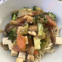 Plain noodles with mushroom sauce, unmarinated tofu. Not worth going out to eat for  at Armazem Integral in Portimao