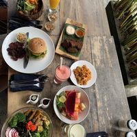 We had the Bali Burger, Happy Bowl, Local Bowl, Spicy Seitan, Nuggets and a Fruit Salad and it was amazing. The staff was friendly and the food came fast 😍 at Vinny's Warung in Canggu