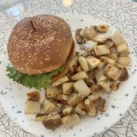 Nashville hot chicken with home fries  at Spiral Diner & Bakery in Denton