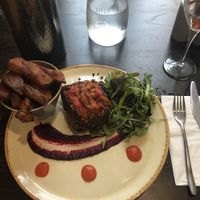 Lentils and nut loaf with salad and fried potatos, only €13,90, super well served and delicious! at Petronella in Kilkenny