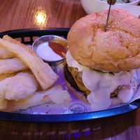 Onion Burger with a fried Yuka as a side at Huacamole Vegan Food in San Pedro