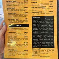 Read the history section in black 🫶  at Huacamole Vegan Food in San Pedro