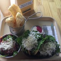 meal deal. Venezuelan tacos, yucca chips and salad  at Huacamole Vegan Food in San Pedro
