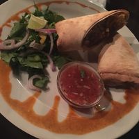 vegetarian burrito made vegan  at Harmony in Ios