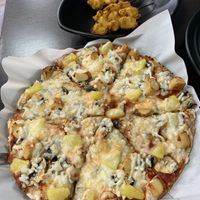 Vegan satay skewers and Hawaiian pizza  at Veggie Hut in Birmingham