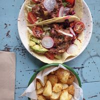 Refried bean taco with fried potatoes. The mint in taco made it great. at Loves Cafe in Weston-super-mare