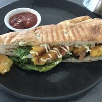 Vegan corn fritters sandwich  at Strata Cafe - The University of Auckland  in Auckland