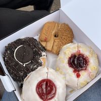 (top left) oreo cheesecake (top right) biscoff (bottom left) glazed jam (bottom right) cherry bakewell  at Doughnotts in Nottingham